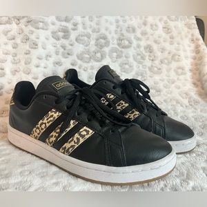 Women’s black Adidas with leopard print